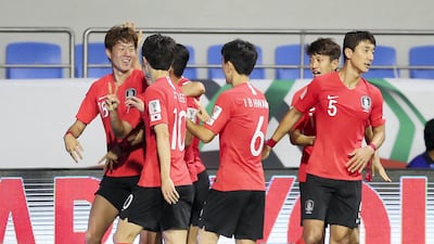 South Korea's Hwang Ui-jo, No 18, celebrates after scoring against the Philippines.