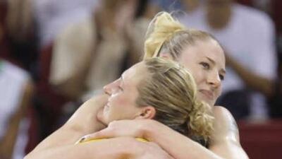 The Australian WNBA star Suzy Batkovic, foreground, and teammate Lauren Jackson celebrate the win over Belarus.