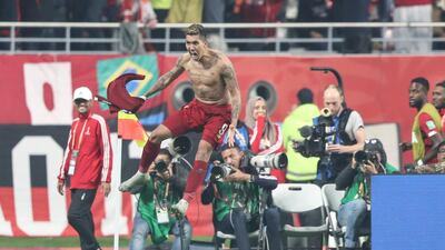 Roberto Firmino celebrates after scoring Liverpool's winning goal against Flamengo in the Fifa World Club Cup final in Doha on Saturday, December 21. EPA