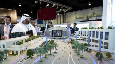 A model of the Opera District, an Emaar project, is displayed at Cityscape 2013 in Dubai. Razan Alzayani / The National