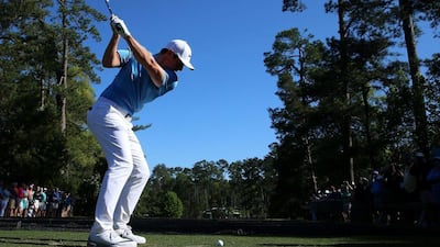 Rory McIlroy of Northern Ireland plays his shot from the sixth tee during a practice round prior to the start of the 2016 Masters Tournament at Augusta National Golf Club on April 5, 2016 in Augusta, Georgia. Andrew Redington/Getty Images/AFP