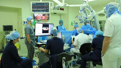 Doctors carry out brain surgery on Salha Al Dhaheri, who was awake during the procedure. Courtesy: Cleveland Clinic Abu Dhabi
