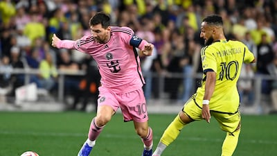 Inter's Lionel Messi skips past the challenge of Nashville midfielder Hany Mukhtar. AP