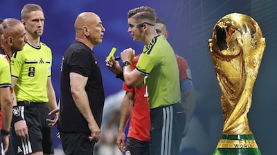 Egypt's coach Hossam Hassan complains to French referee Francois Letexier. Getty Images