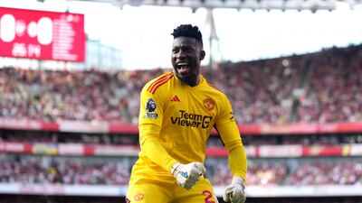 Manchester United goalkeeper Andre Onana celebrates Marcus Rashford's goal. PA
