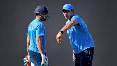 Ravi Shastri, right, has instilled in the Indian cricket team a sense of positivity in recent times. Saurabh Das / AP Photo