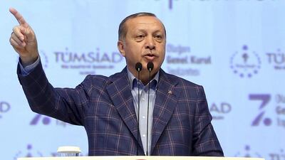 Turkey's president Recep Tayyip Erdogan delivers a speech at a conference in Istanbul on April 29, 2017, during which he said that, together, Ankara and Washington could turn Raqqa into an ISIL graveyard. Press Presidency Press Service via AP, Pool