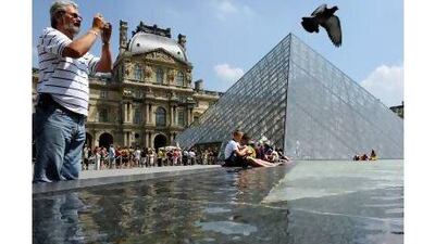 A reader says the new Louvre in Abu Dhabi will be as big a draw as the original in Paris. Philipp Guelland / AFP