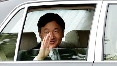 Japan's new Emperor Naruhito waves as he leaves the Imperial Palace in Tokyo, Japan May 1, 2019. Reuters