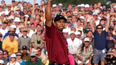 Tiger Woods after sinking the final, winning putt on the 18th hole. AFP