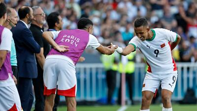 Morocco's Soufiane Rahimi, right, scored twice in the 6-0 win over Egypt. AP