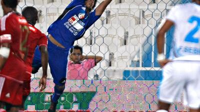 Ahmed Ali Murbarak makes a spectacular save for Jazira as Baniyas look to come back into the game. They would ultimately lose the tightly contested match 3-2. Jeff Topping/The National