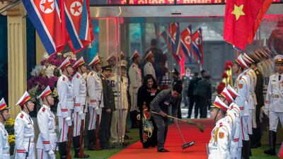 The red carpet is swept in preparation for the arrival of Kim Jong-un. EPA