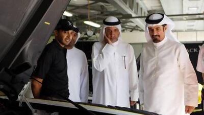 Dubai, United Arab Emirates, Jan 09 2013, Dunlop 24h Series, - (right To left) ATCUAE President and FIA Vice President Dr. Mohamed Ben Sulayem, DUbai Autodrome Chairman Ali Fardan Al Fardan, and Lart years winner Driver Khalid Al Qubaisi at the Dunlop 24h series. The venue is being held at the Dubai Autodrome. Mike Young / The National??