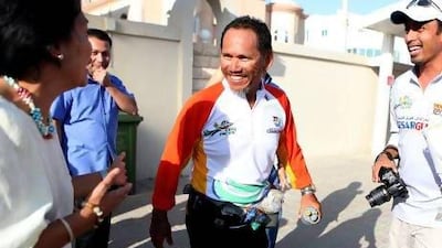 Cesar Guarin, seen here in Abu Dhabi recently, plans to be the first Filipino global runner, covering 42,000km across 47 countries. Fatima Al Marzooqi / The National