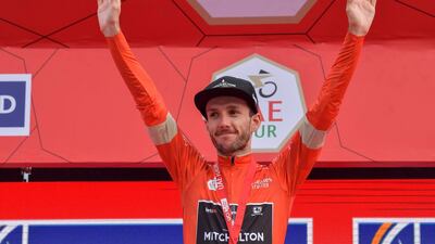 Race leader, Britain's Adam Yates of team Mitchelton–Scott on the podium. AFP