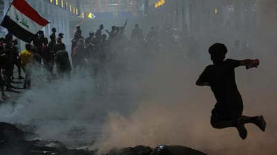 Iraqi protesters demand free elections and an end to corruption in Basra. AP Photo