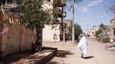 A woman walks in Omdurman, Sudan on November 1, 2024. Sudanese politicians have accused Tehran of supporting armed Islamists in the war-torn country. EPA