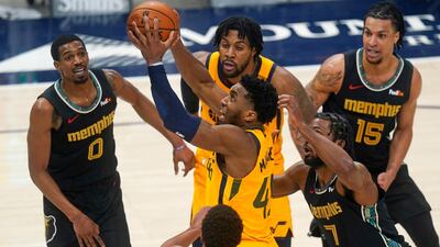 Utah Jazz guard Donovan Mitchell (45) goes to the basket against the Memphis Grizzlies. AP