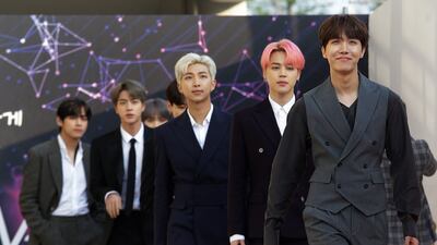 BTS members arrive at The Fact Music Awards in Incheon, South Korea, in 2019. AP