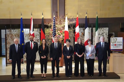 James Cleverly, second left, mixes with G7 foreign secretaries. AP