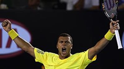 Jo Wilfried-Tsonga celebrates after securing his blistering victory over the American James Blake in the fourth round of the Australian Open.
