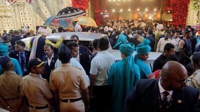 The car carrying the groom, Anand Piramal, arrives at the venue. AP Photo