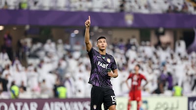 Al Ain's Houssine Rahimi celebrates scoring the second goal against Tractor