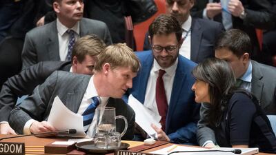 British deputy ambassador to the UN, Jonathan Allen, left, speaks to America's envoy Nikki Haley at the end of the Security Council meeting on the situation between Britain and Russia. AP Photo/Mary Altaffer