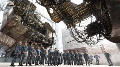 South Korean sailors gather at the wreckage of the Cheonan warship, which was sunk by a North Korean torpedo in 2010, killing 46, at a naval base in Pyeongtaek, south of Seoul. EPA