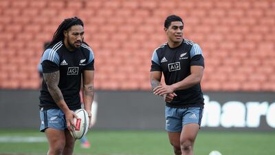 Ma'a Nonu, left, holds onto the ball as fellow centre Malakai Fekitoa looks on during the New Zealand All Blacks captain's run at the Waikato Stadium on June 20, 2014 in Hamilton, New Zealand. David Rogers / Getty Images