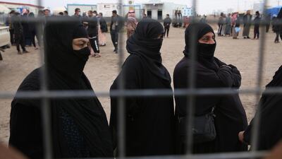 Iraqis wait to get personal Identification cards and birth certificates for their children who were born under the rule of ISIS. EPA