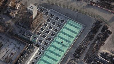 The green material is waterproofing designed to keep the museum watertight for generations. Silvia Razgova / The National