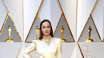 Dakota Johnson choose a gold lamé fluted dress by Gucci – a brave choice by anyone’s standards, but managed to make it look effortless. Mike Nelson / EPA