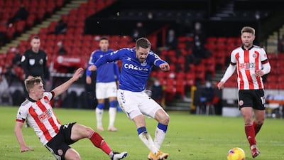 Everton midfielder Gylfi Sigurdsson scores the only goal of the game against Sheffield United. AFP