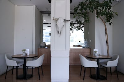 Sleek decor at No Fifty Seven Boutique Cafe. Khushnum Bhandari / The National