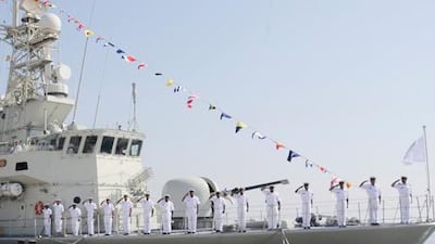 Sailors salute during the opening of a new naval base in Fujairah, designed to protect vital shipping lanes in the region.