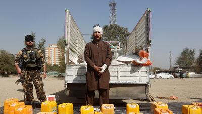 A captured Taliban insurgent is presented to the media after he was arrested with car explosive devices in Kabul, Afghanistan on October 15, 2017. Omar Sobhani / Reuters