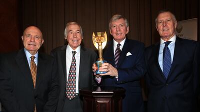 From leftL Former England and World Cup winning players George Cohen, Gordon Banks, Martin Peters and Sir Geoff Hurst with the Jules Rimet trophy. PA