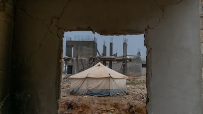 A family’s tent, surrounded by rubble, in the town of Jindires, in Aleppo province, north-west Syria. A year on from the 7.8 magnitude earthquake that devastated parts of southern Turkey and northern Syria on February 6, 2023, some Syrians are still living in makeshift accommodation. All photos: Moawia Atrash for the National