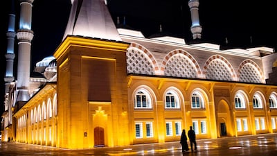 Worshippers arrive for prayers at the Camlica Mosque in Istanbul. AFP