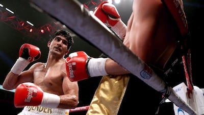 Vijender Singh, left, of India and Sonny Whiting of Great Britain exchange blows during their International Middleweight contest at Manchester Arena on October 10, 2015 in Manchester, England. (Photo by Ben Hoskins/Getty Images)