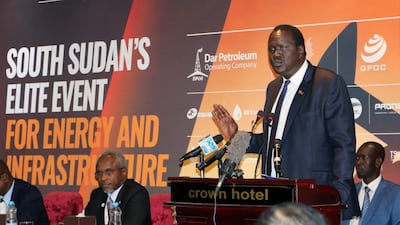 South Sudan's petroleum minister Ezekiel Gatkuoth welcomes potential investors during the second Africa Oil and Power conference in Juba. AP