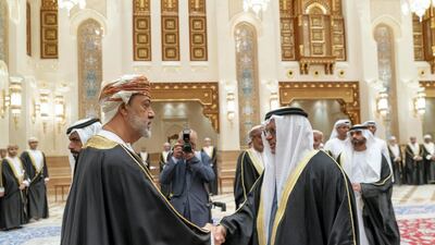 Dr Anwar Gargash, Minister of State for Foreign Affairs, right, offers condolences to Sultan Haitham bin Tariq of Oman. Mohamed Al Hammadi / Ministry of Presidential Affairs