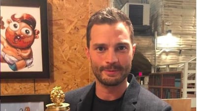 Actor Jamie Dornan with his Worst Actor Razzie for the film 'Fifty Shades of Grey' in 2016. Courtesy Instagram / @the_razzies