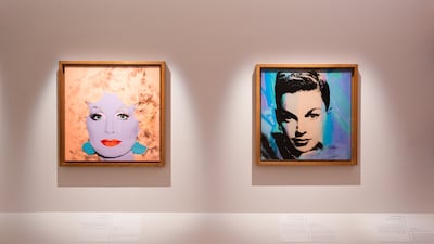 The show demonstrates the artist's fixation on fame with distinct silkscreen prints of stars including Dolly Parton (1985) left, and Judy Garland (1979). Photo: Arts AlUla / The Andy Warhol Foundation for the Visual Arts
