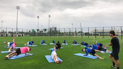 Wuhan Three Towns Football Club players taking part in a training session in Haikou in China's southern Hainan province. AFP