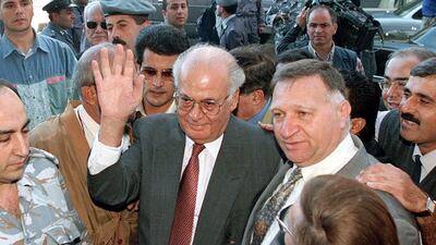 Lebanese prime minister-designate Mr Al Hoss waves to his supporters as he arrives at his home in Beirut in December 1998. AFP