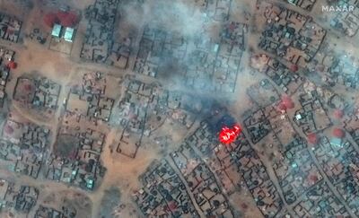 A satellite image shows smoke and fire at Zamzam Camp, which hosts displaced people, in North Darfur, Sudan. Reuters.