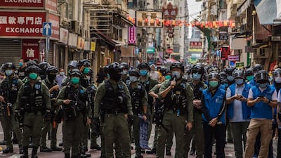 Under the memorandum, people from Hong Kong currently residing in the US can live and work in the country for 18 months. AFP